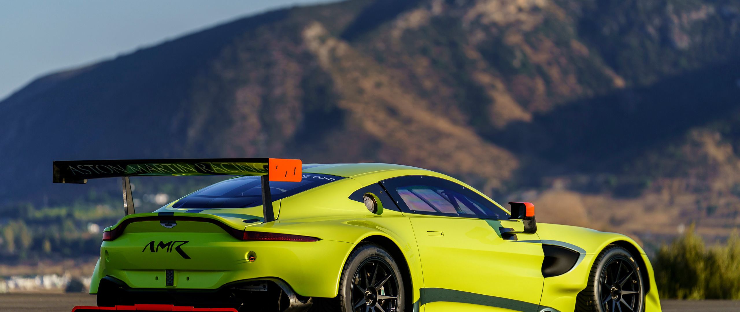 2560x1080 Aston Martin Vantage Back 4k 2560x1080 Resolution Hd 4k Wallpapers Images Backgrounds Photos And Pictures
