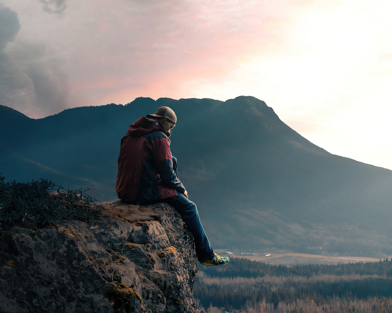 boy-sitting-alone-on-high-mountain-rock-5k-rj.jpg