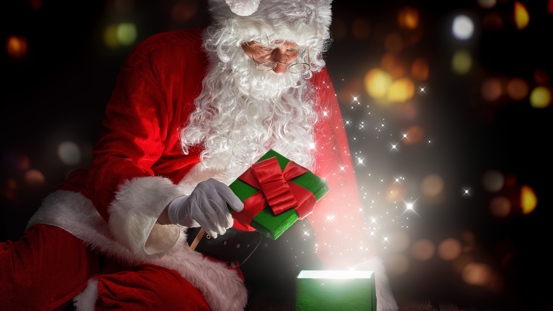 Santa Claus mở quà Noel và nụ cười của trẻ em là cảnh tượng đáng yêu trong ngày lễ tuyệt vời này. Hãy xem hình ảnh này để tận hưởng không khí Noel ấm áp và đầy sự hy vọng, cũng như tràn đầy tình yêu thương đối với mọi người.