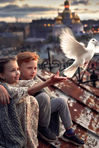 little-boy-and-girl-pigeon-roof-4k-ho.jpg