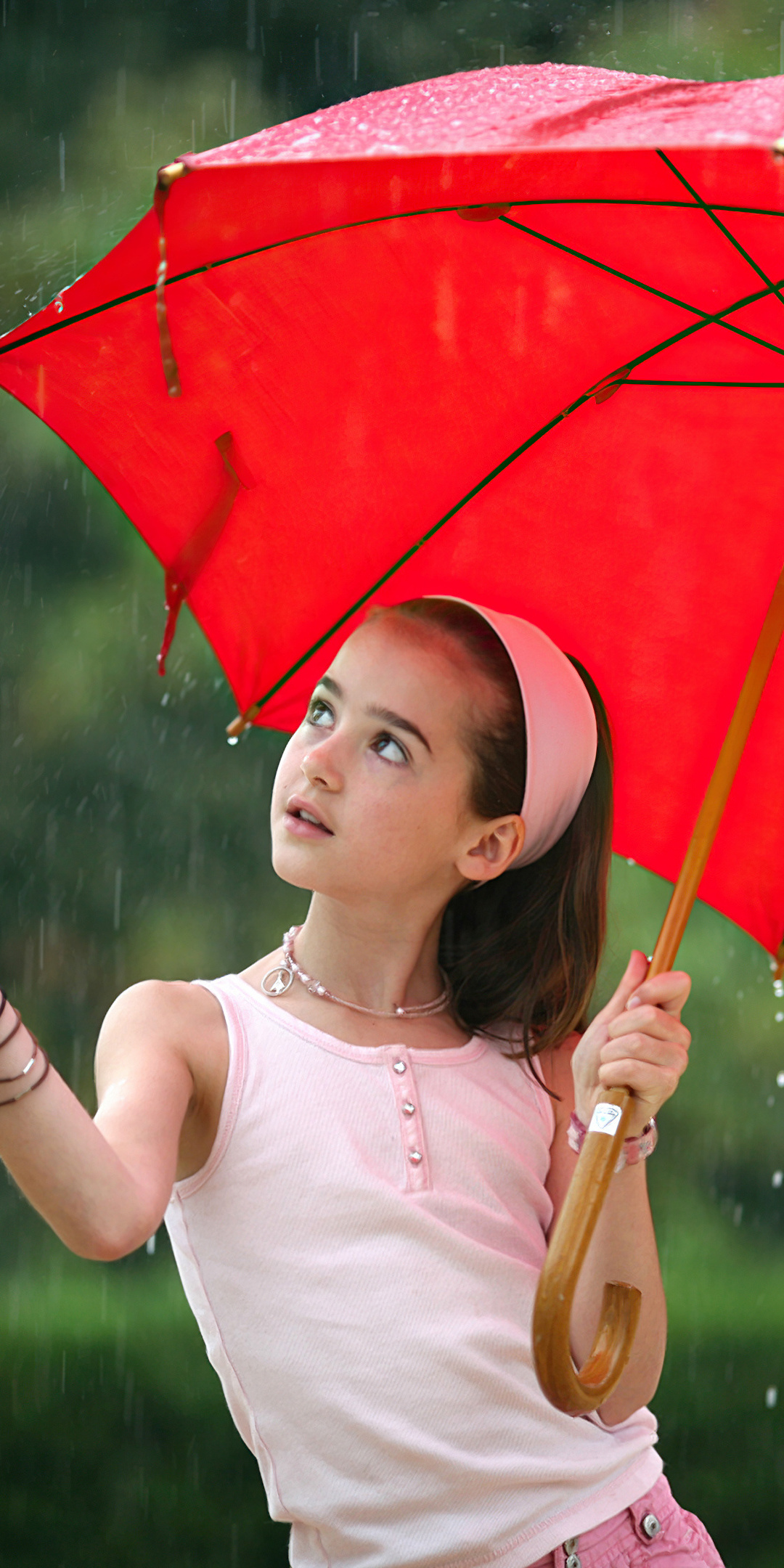 little-girl-in-rain-with-umbrella-4k-iv.jpg