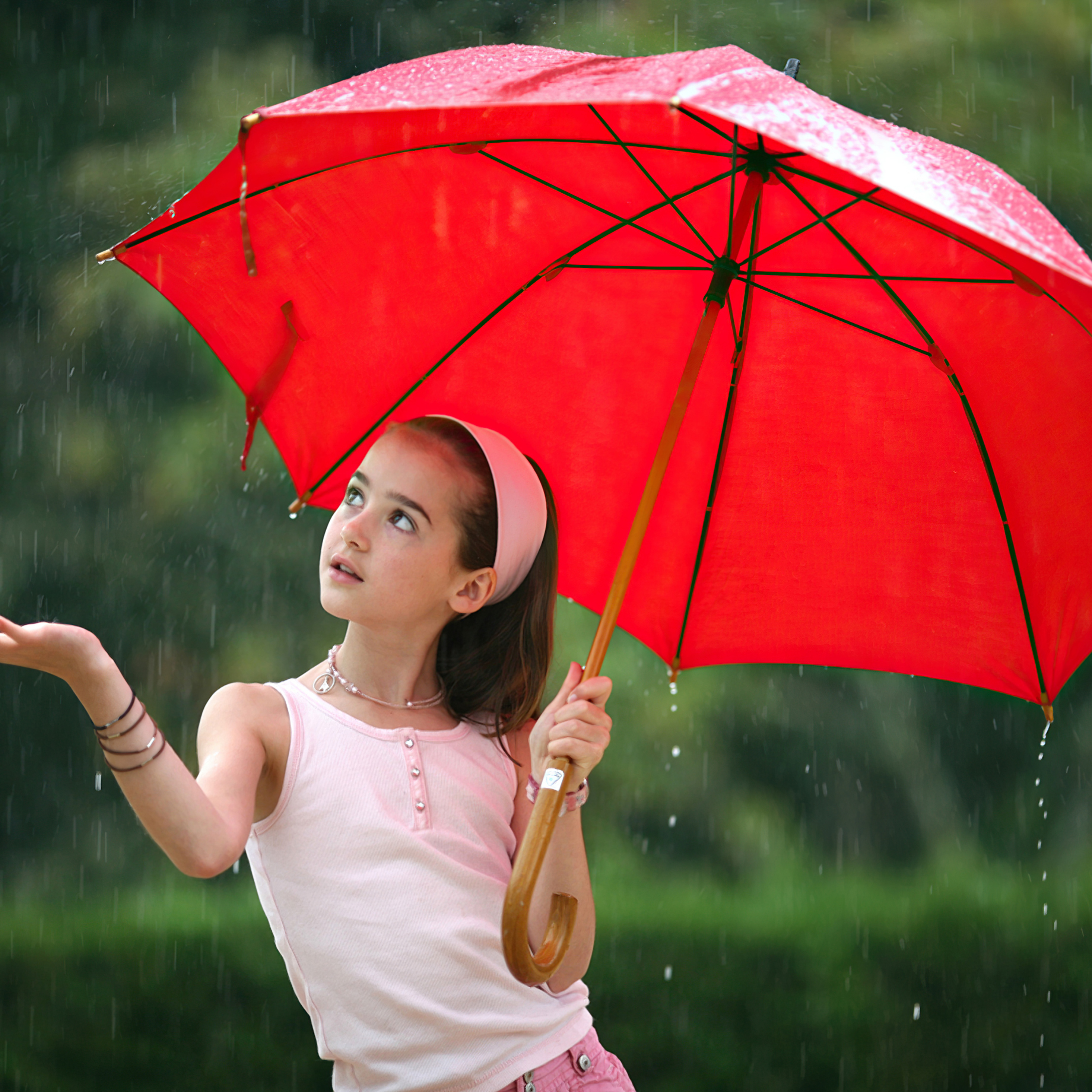 little-girl-in-rain-with-umbrella-4k-iv.jpg