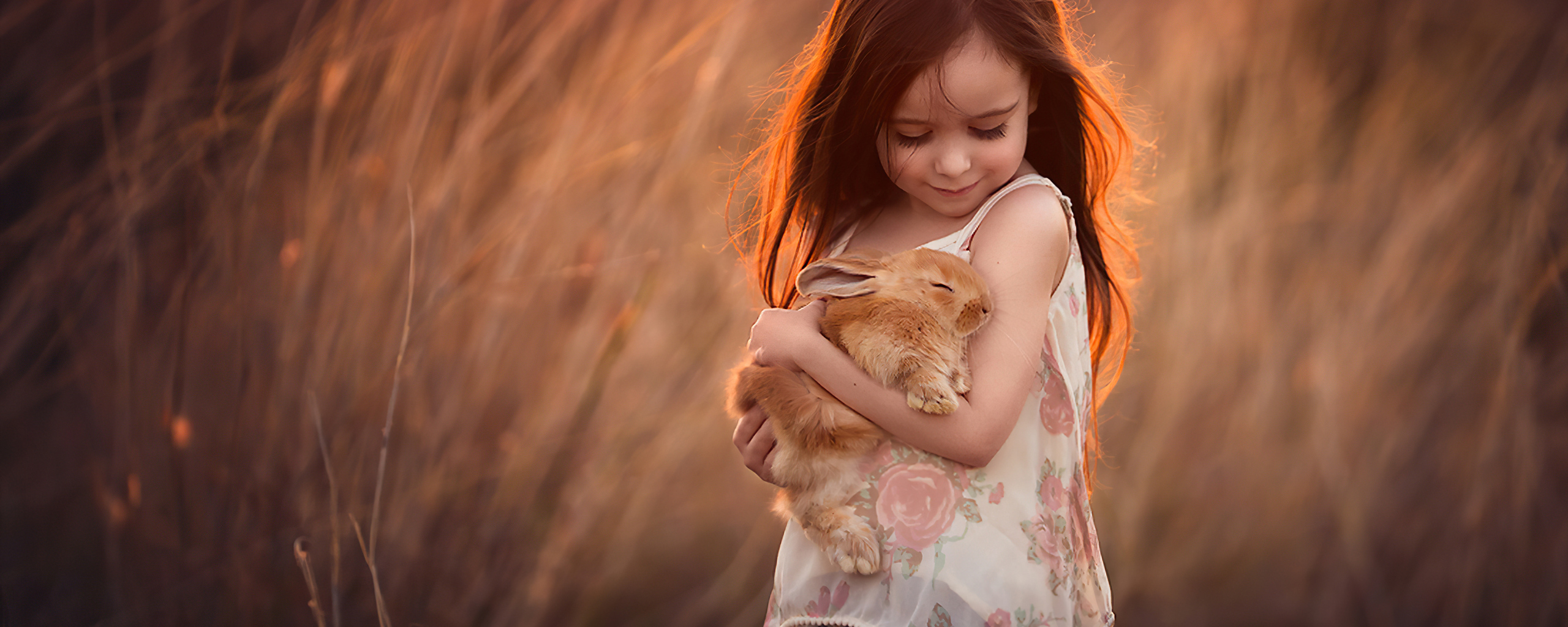 little-girl-with-rabbit-in-hands-4k-12.jpg