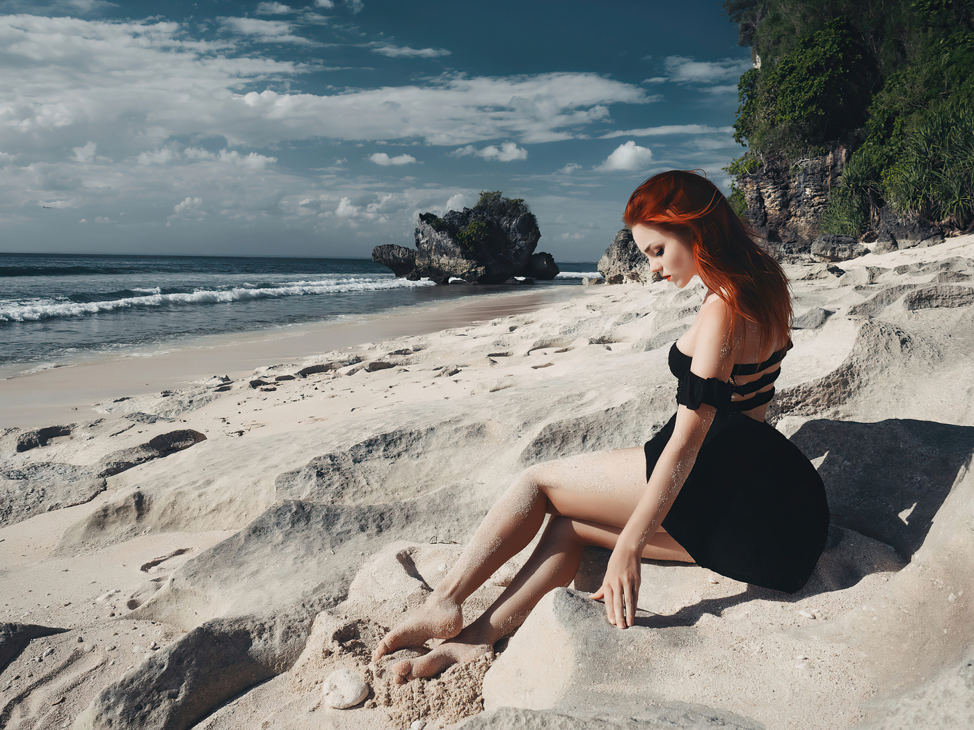 redhead-girl-sitting-on-beach-black-clothing-4k-tc.jpg