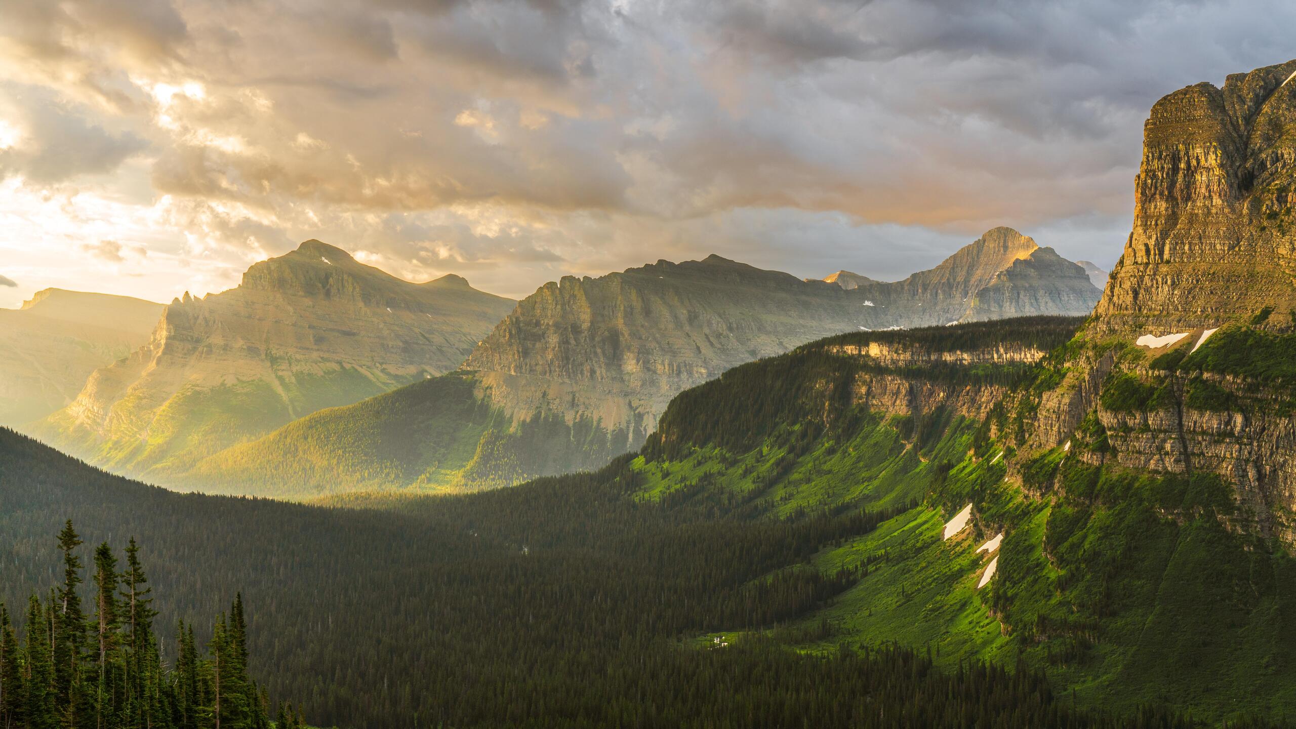 2560x1440 Stormy Sunrise At Glacier National Park 8k 1440P Resolution