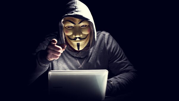 Anonymus Hacker In Mask Pointing Finger Wallpaper