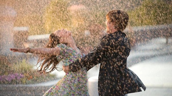 Beautiful Couple In Rain Wallpaper