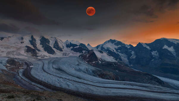 Bernina Mountains And Blood Moon Switzerland Wallpaper