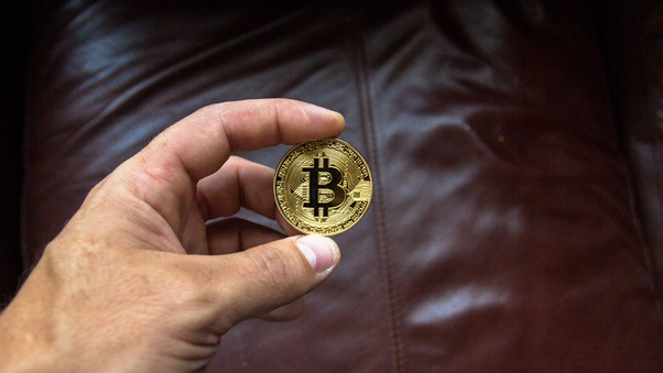 Bitcoin Coin In Person Hand Wallpaper
