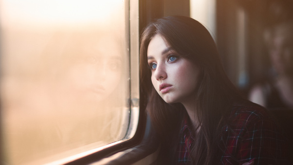 Blue Eyes Girl Looking Outside Window 5k Wallpaper