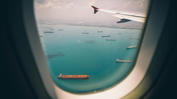 Boats Sea View From Airplane Window Wallpaper