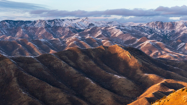 Brown And Green Mountains Under White Clouds During Daytime (2560x1440) Resolution Wallpaper