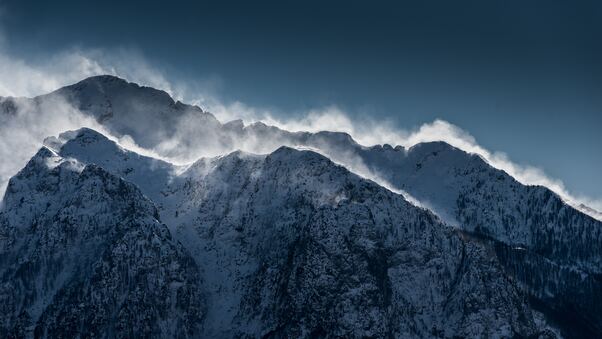Clouds Over Snow Mountain Range Cliff Wallpaper