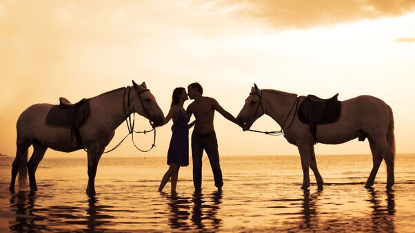 Couple With Horses On Beach 4k Wallpaper