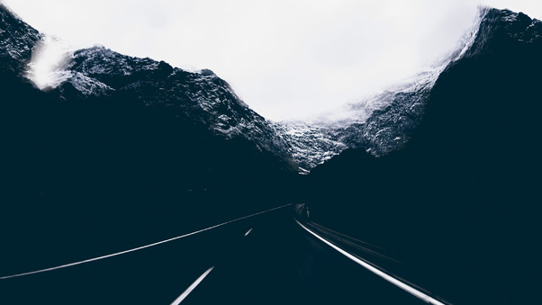 Dark Road Covered By Mountains Wallpaper
