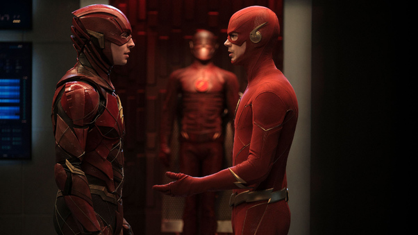 Ezra Miller As Flash Meets Barry Allen In Crisis On Infinite Earths Wallpaper