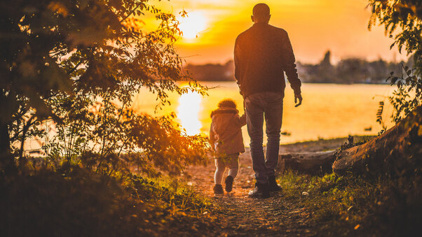 father-and-kid-walking-towards-lake-3o.jpg
