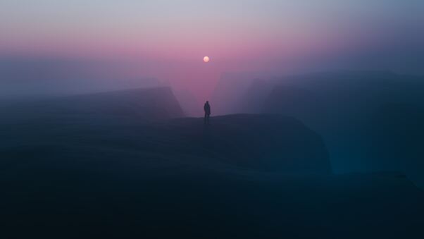 Foggy Horizons Person Standing At A Top Of Mountains Wallpaper