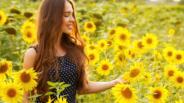 Girl In Sunflower Field Smiling Wallpaper