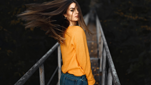 Girl Looking Back Orange Sweater Wallpaper