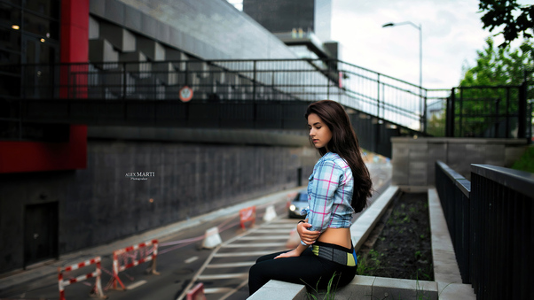 Girl Sitting City Outdoor 5k Wallpaper