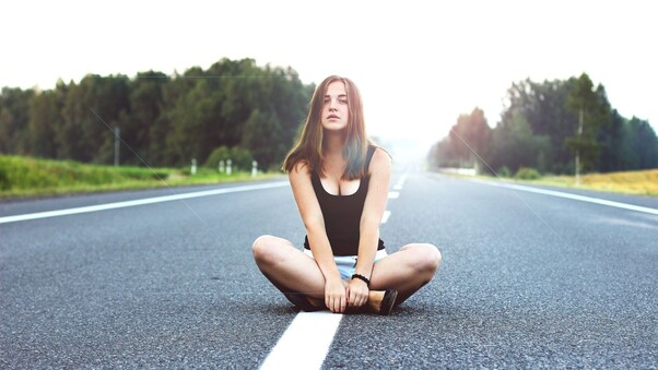 Girl Sitting On Road Wallpaper
