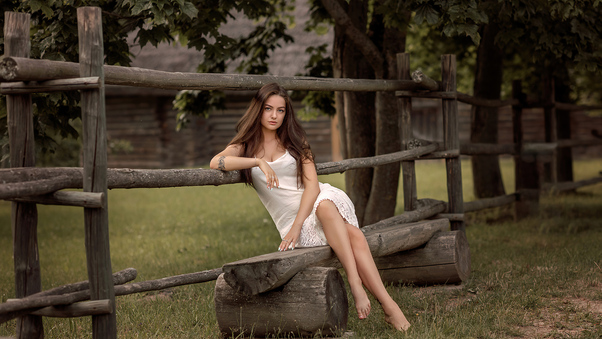 Girl Sitting On Wooden Fence Bench Wallpaper