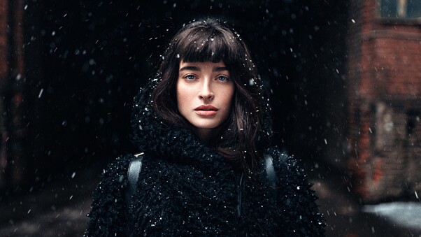 Girl Standing In Snow Wallpaper