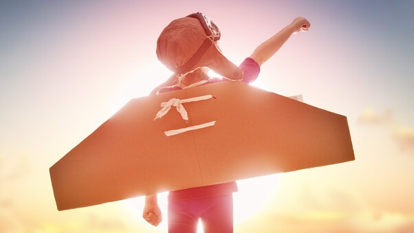 Girl With Flying Cardboard Wallpaper