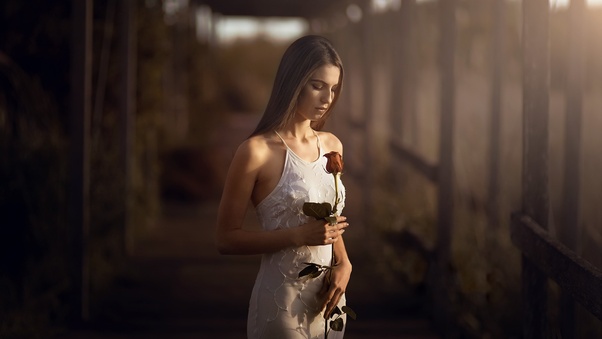 Girl With Rose In Hand Wallpaper