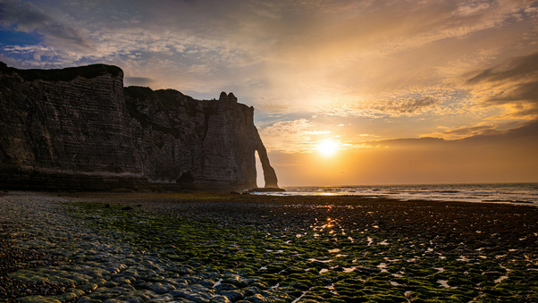 Golden Sunset Through Natural Stone Arch (2560x1080) Resolution Wallpaper