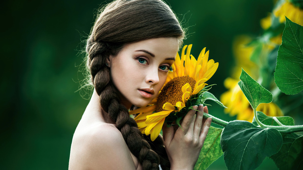 Green Eyes Girl Posing With Solidago Flowers Wallpaper