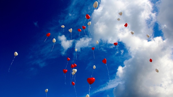 Heart Shape Balloons In Sky Wallpaper