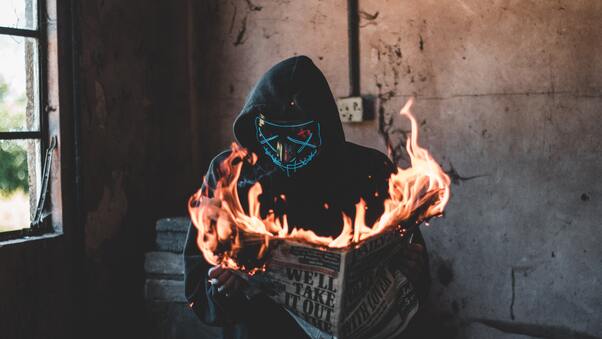 Hidden Mask Guy Burning Newspaper Wallpaper