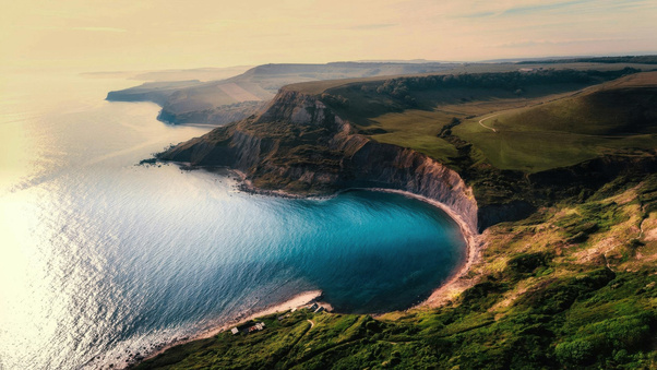 Hidden Turquoise Cove Along Dramatic Cliffs (2560x1024) Resolution Wallpaper