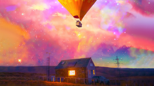 Hot Air Balloon Flying Over House Wallpaper