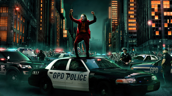 Joker Dancing On Cop Car 4k Wallpaper