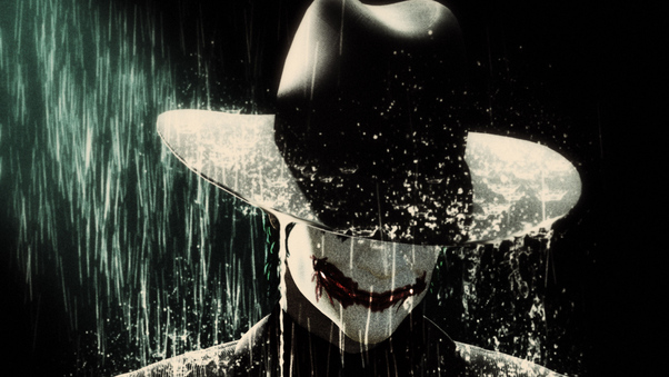 Joker In Rain Wearing Hat Wallpaper