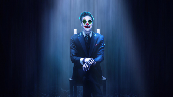 Joker Sitting On Chair Wallpaper