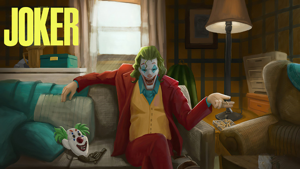 Joker Sitting On Sofa Wallpaper