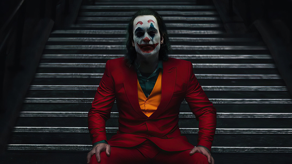 Joker Sitting On Stairs 4k Wallpaper
