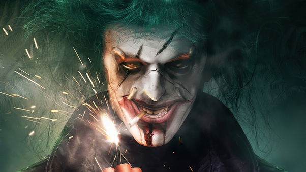 Joker With Fire Bomb Wallpaper