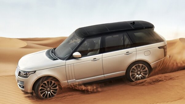 Land Rover In Desert Wallpaper