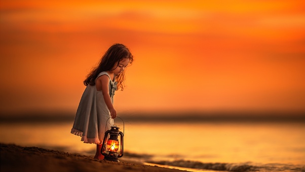 Little Girl On Beach Near Shutdown With Her Lantern Wallpaper