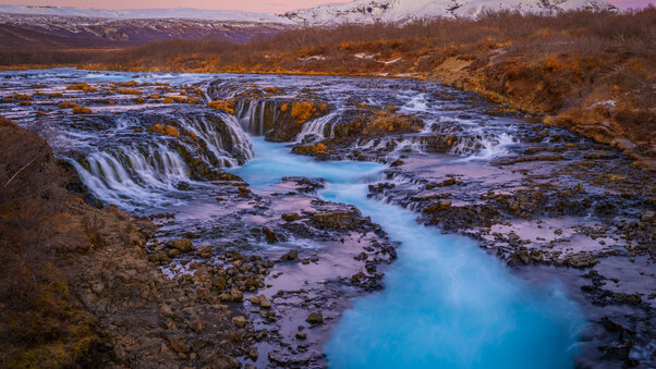 Majestic Flow Bruarfoss And The Icelandic Mountain Tapestry Wallpaper