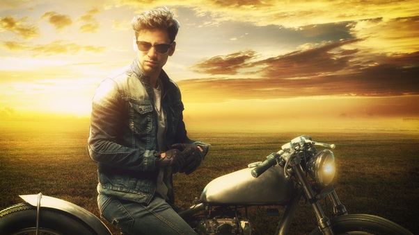 Man On A Motorbike At Sunset Wallpaper