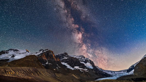 Milky Way And Galactic Core Area Over Mount Andromeda Wallpaper