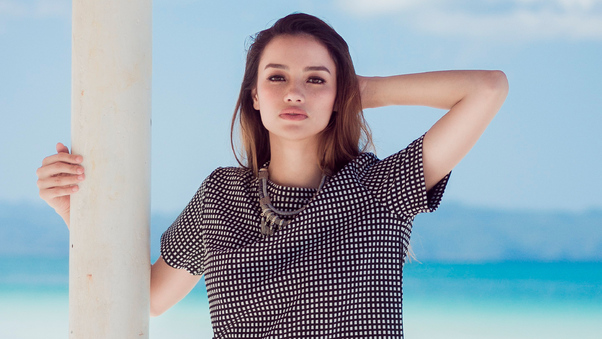 Model Photoshoot On Beach Wallpaper