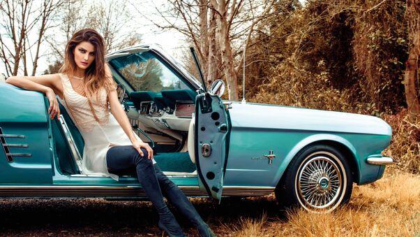 Model Sitting In Vintage Car Wallpaper