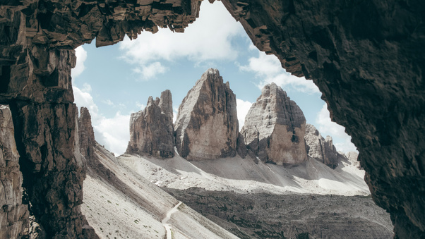 Mountain Range Through Cave Wallpaper